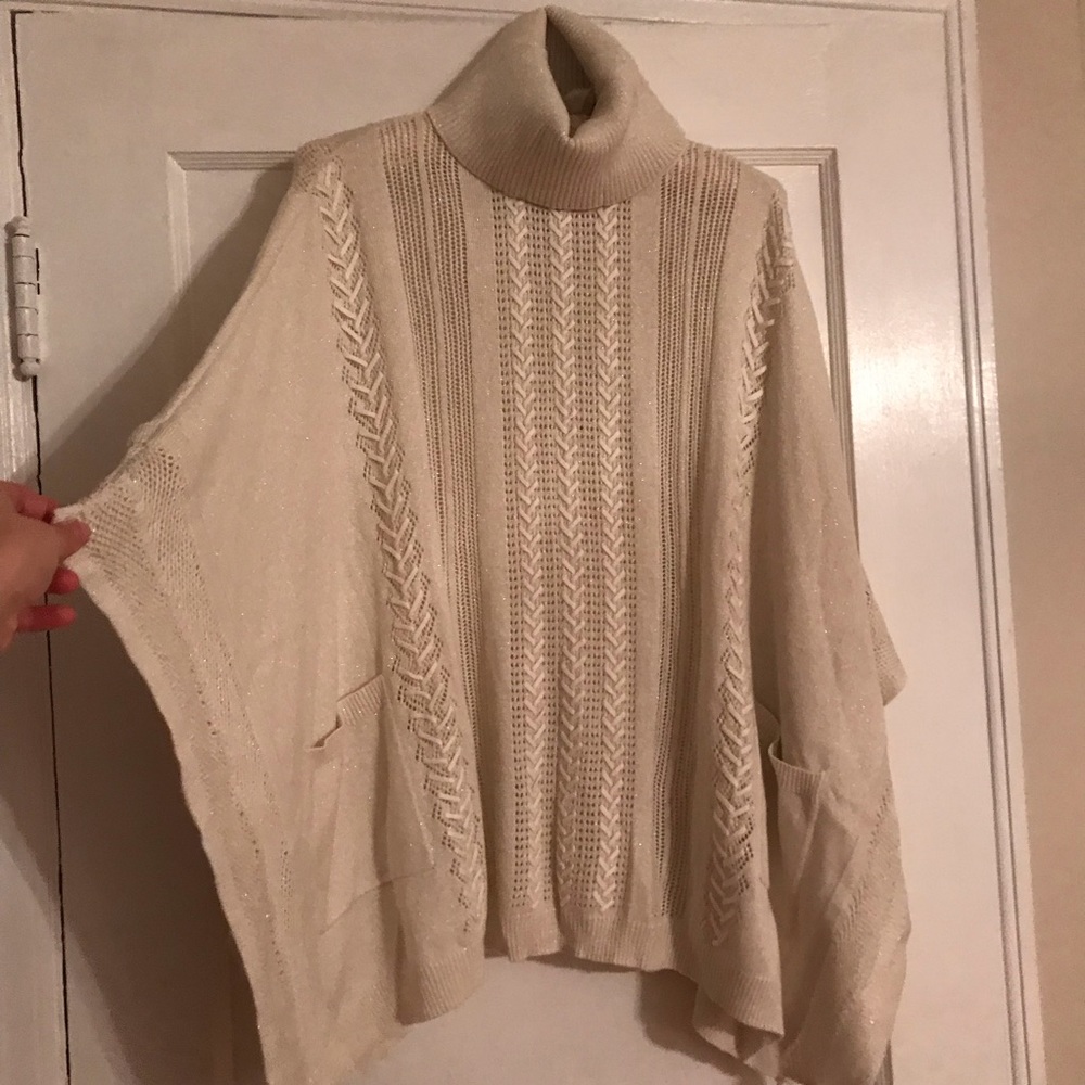 White turtleneck poncho